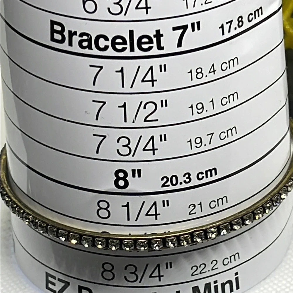 Elegant Gold tone and clear rhinestone Bangle Bracelet